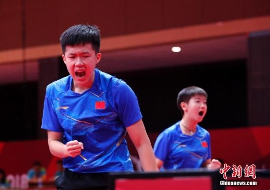 資料圖：雅加達(dá)亞運(yùn)會(huì)，王楚欽/孫穎莎奪得混雙冠軍。 <a target='_blank' href='/'>中新社</a>記者 劉關(guān)關(guān) 攝