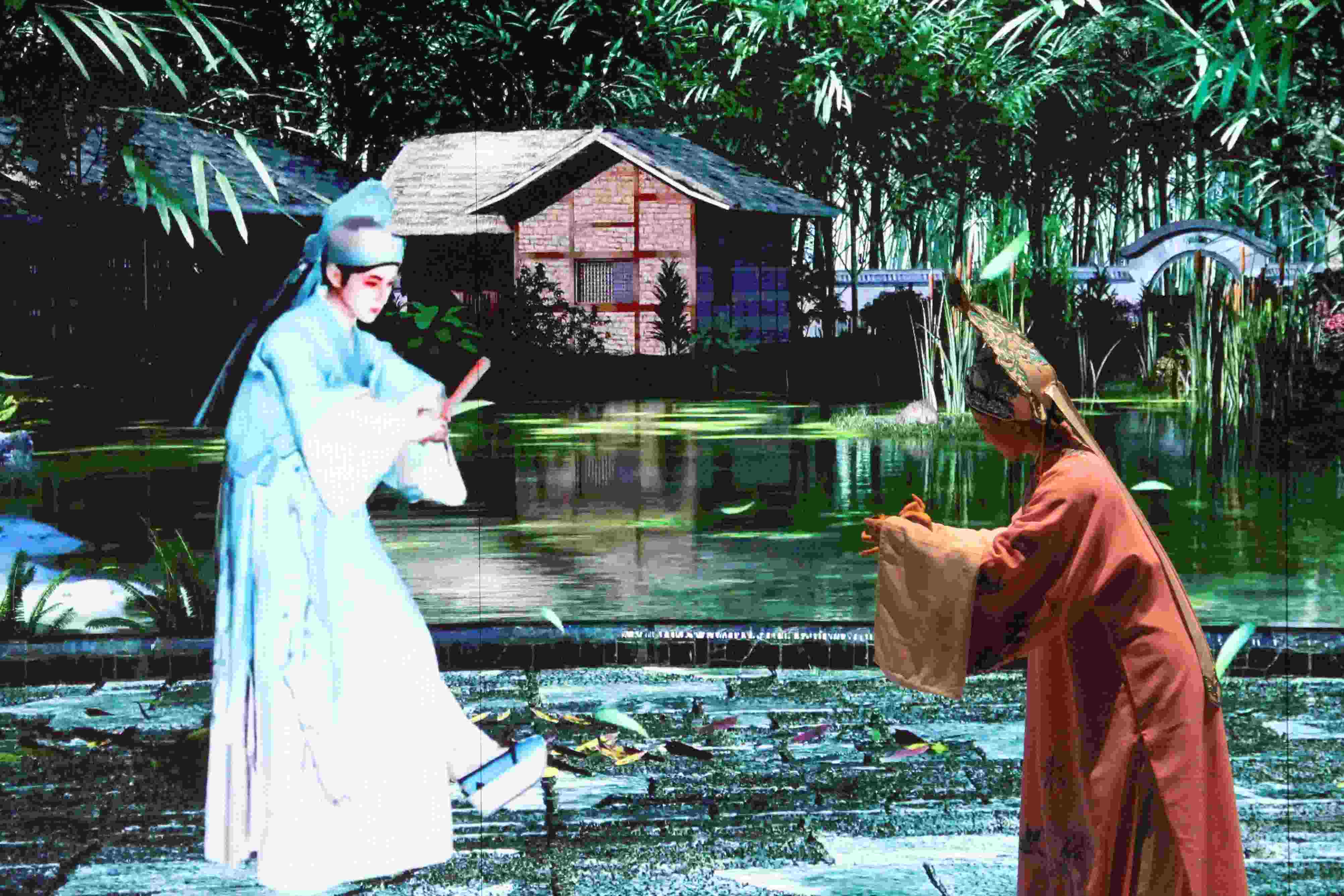 真人演員與虛擬人演員在“元啟金陵”南京數(shù)字文化客廳出演《梁山伯與祝英臺(tái)》經(jīng)典選段。受訪者供圖