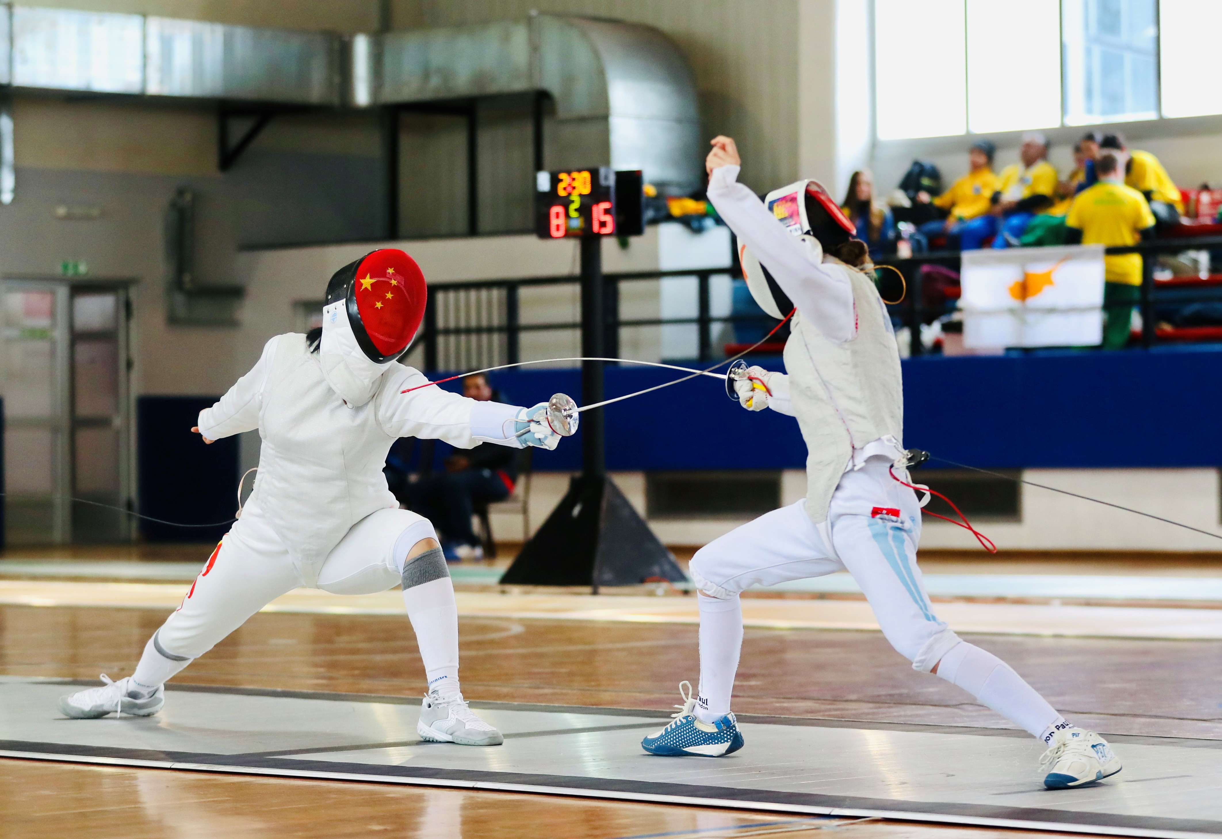 閔文珺（左）在比賽中。圖片來源：中國(guó)中學(xué)生體育代表團(tuán)